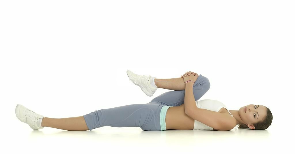 knee to chest pose